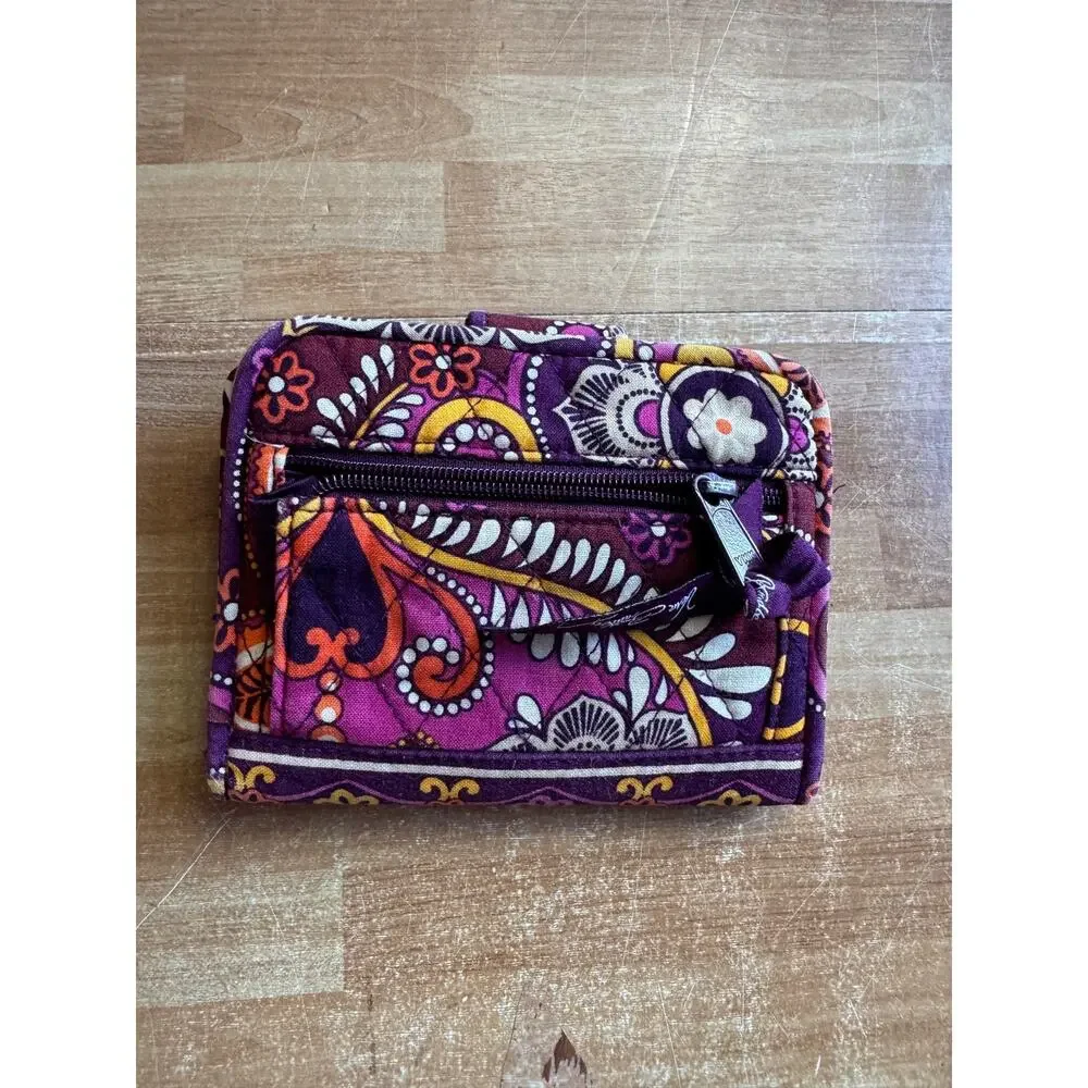 Vera Bradley Turnlock Wallet in the retired Safari Sunset pattern.